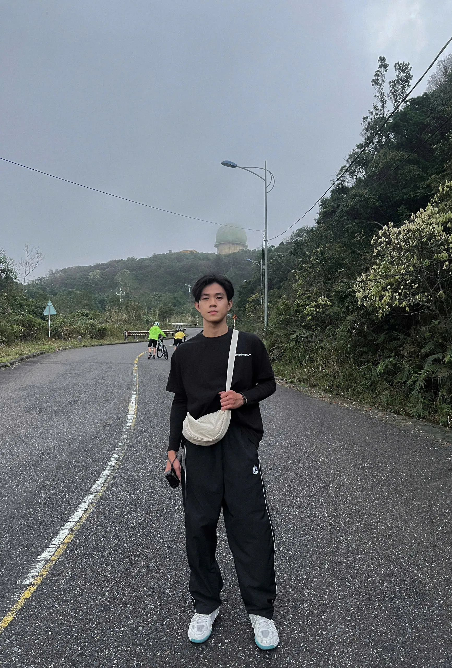Outdoor portrait on a mountain road
